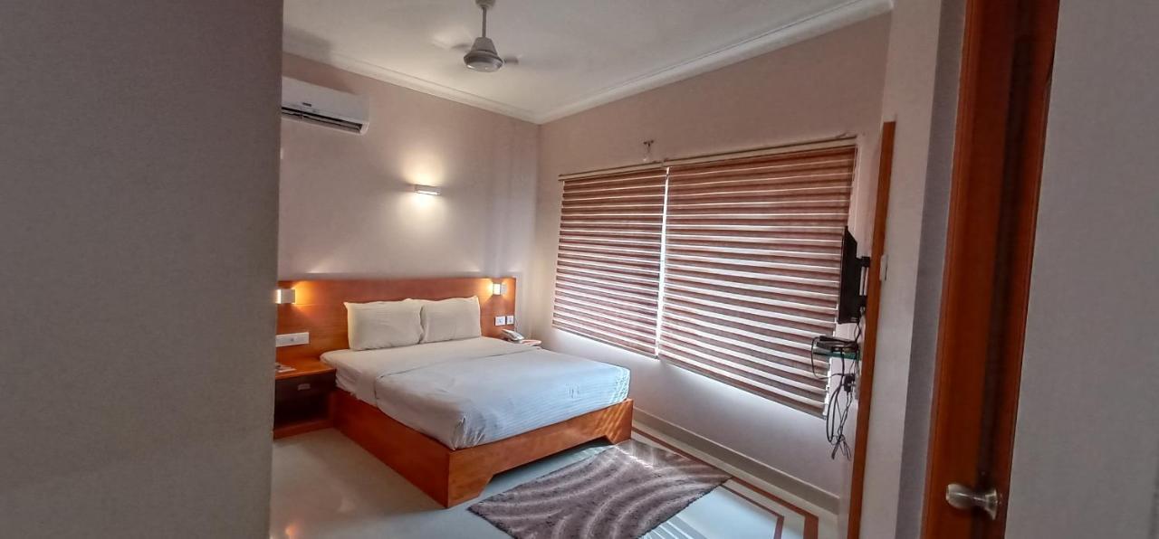 Hôtel Devanganam Residency à Guruvāyūr Extérieur photo